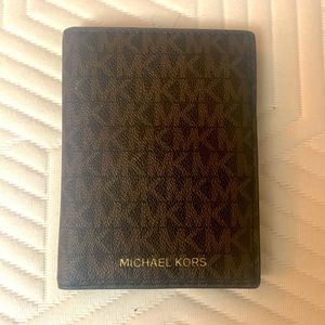 Michael Kors booklet wallet. Brand new also real.